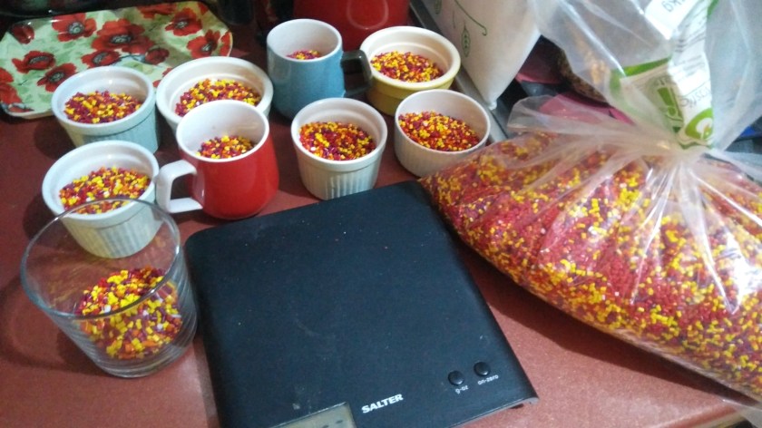 Kitchen scales with pellets measured out for the filling.